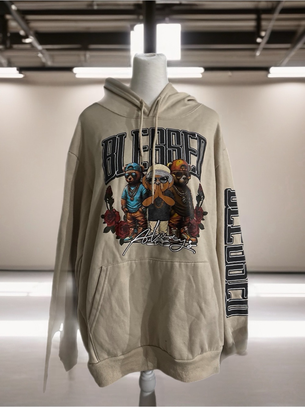 Beige 'Blessed' Graphic Hoodie with Multicolor Character Print